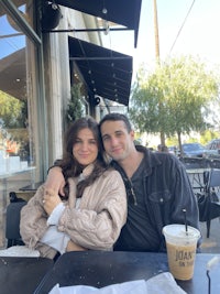 a man and a woman sitting at a table